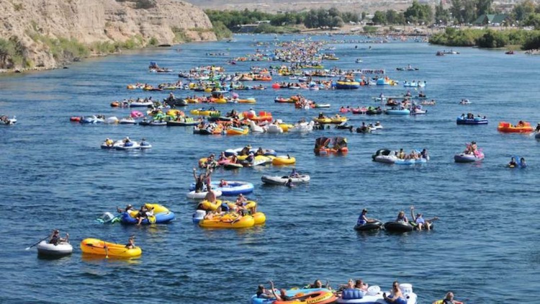 A river with people tubing